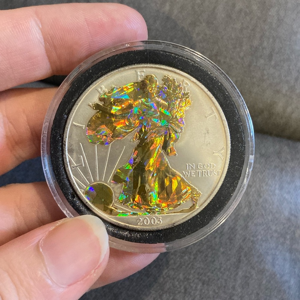 Collectible silver coin with gold plated lady liberty and seal. 1 oz fine silver